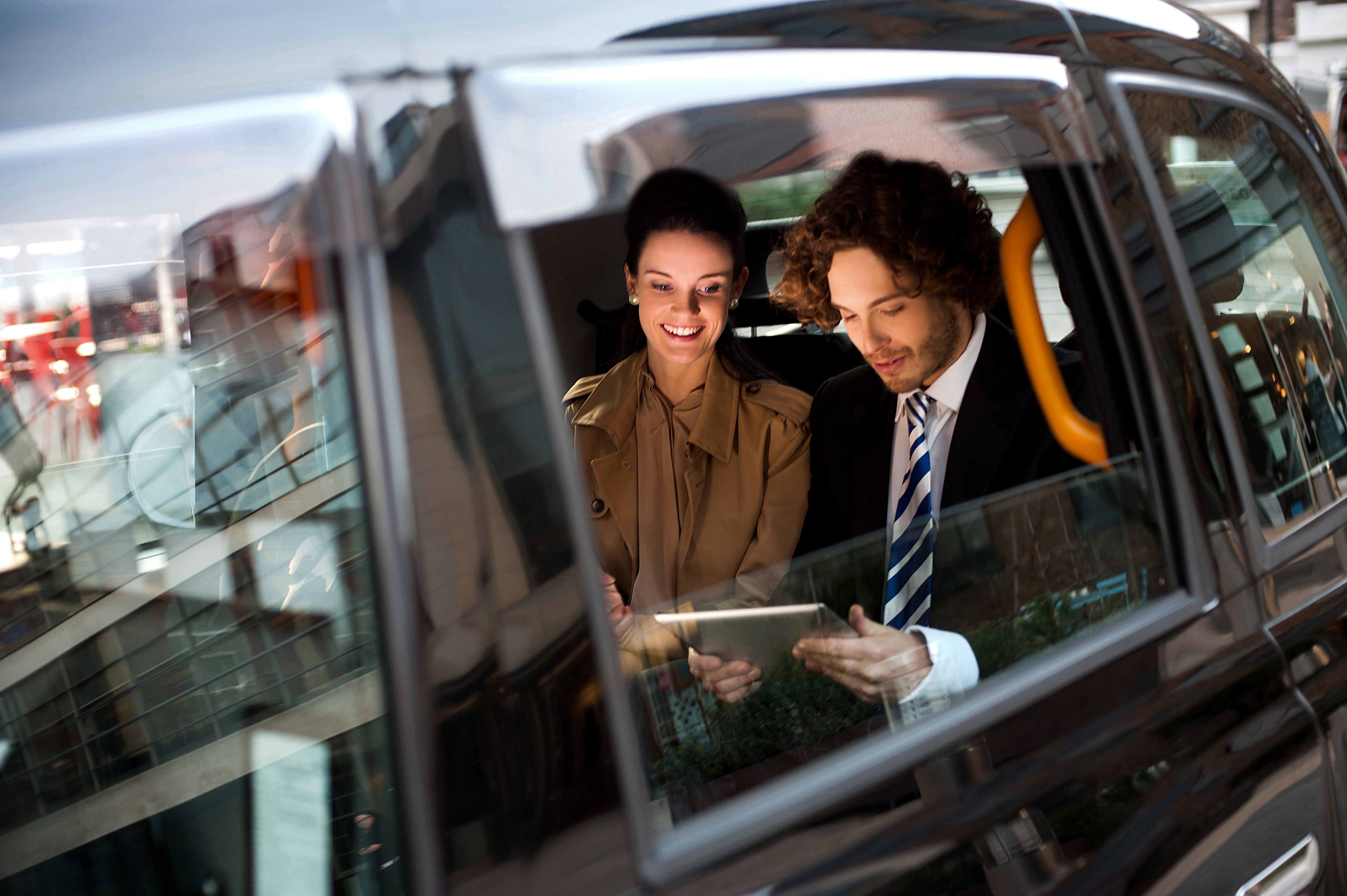 Two people sitting in a car