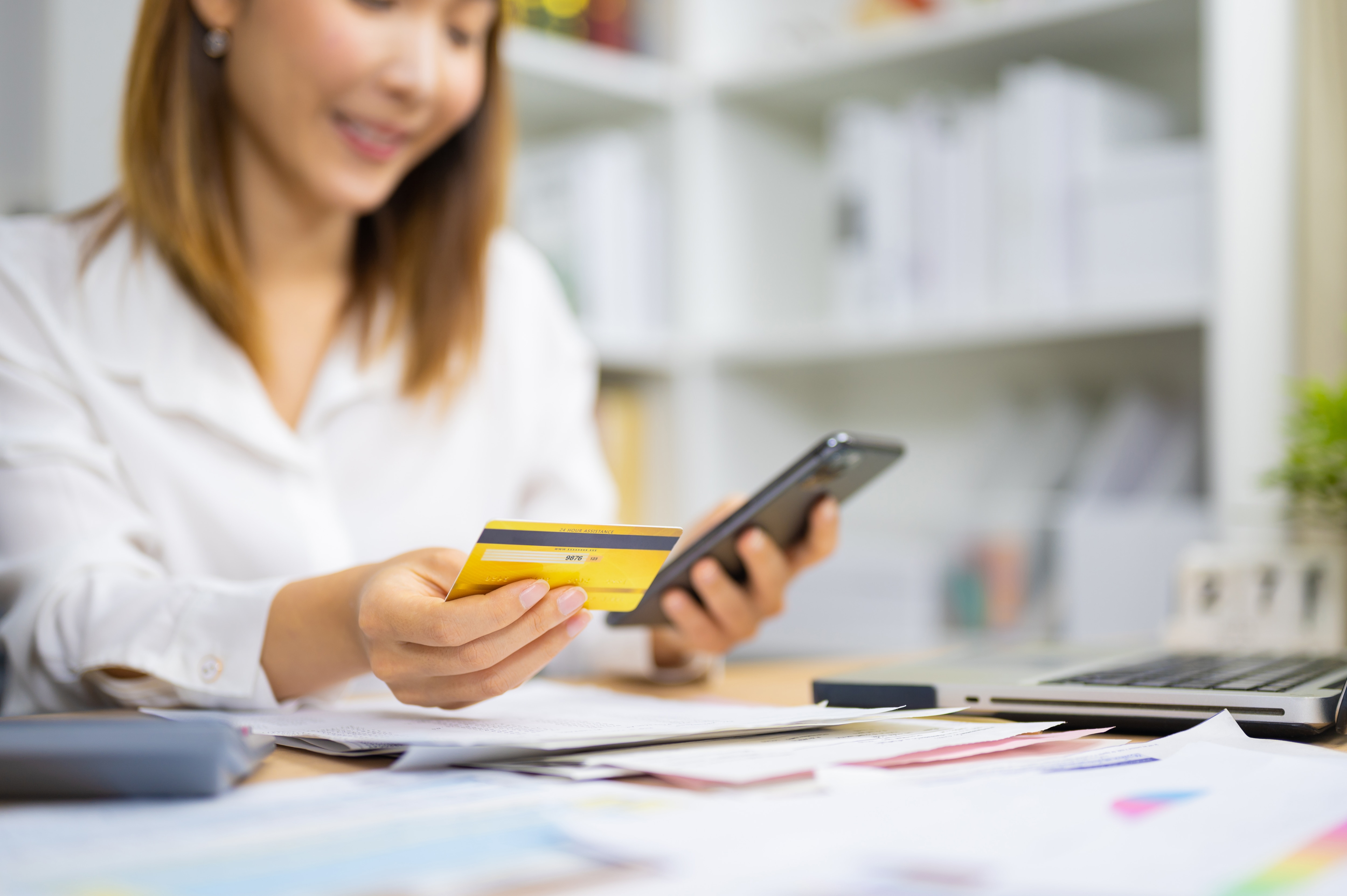 Woman holding credit card