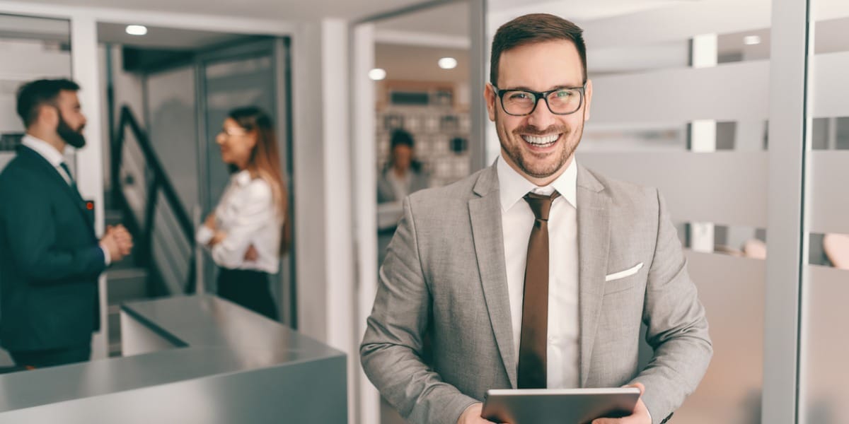 man smiling, office setting