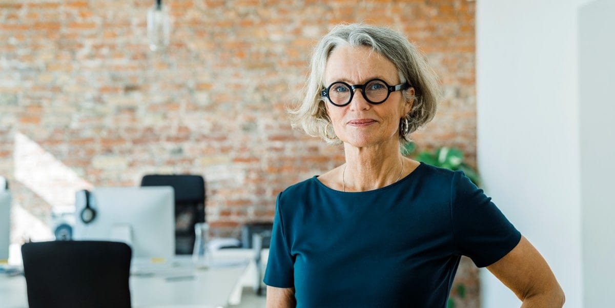 professional woman in office smiling