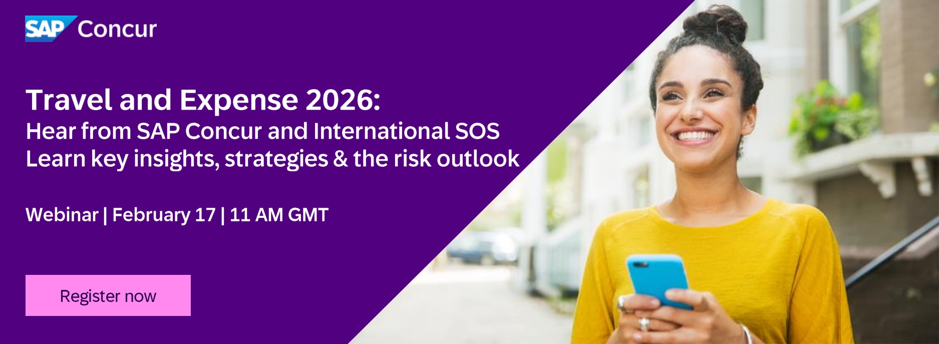 woman in yellow jumper with mobile phone